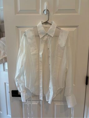 Sheer blouse with tie sleeves